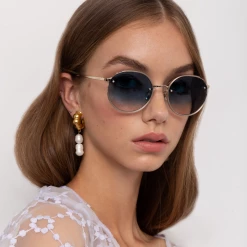 Linda Farrow Nicks Oval Sunglasses In White Gold
